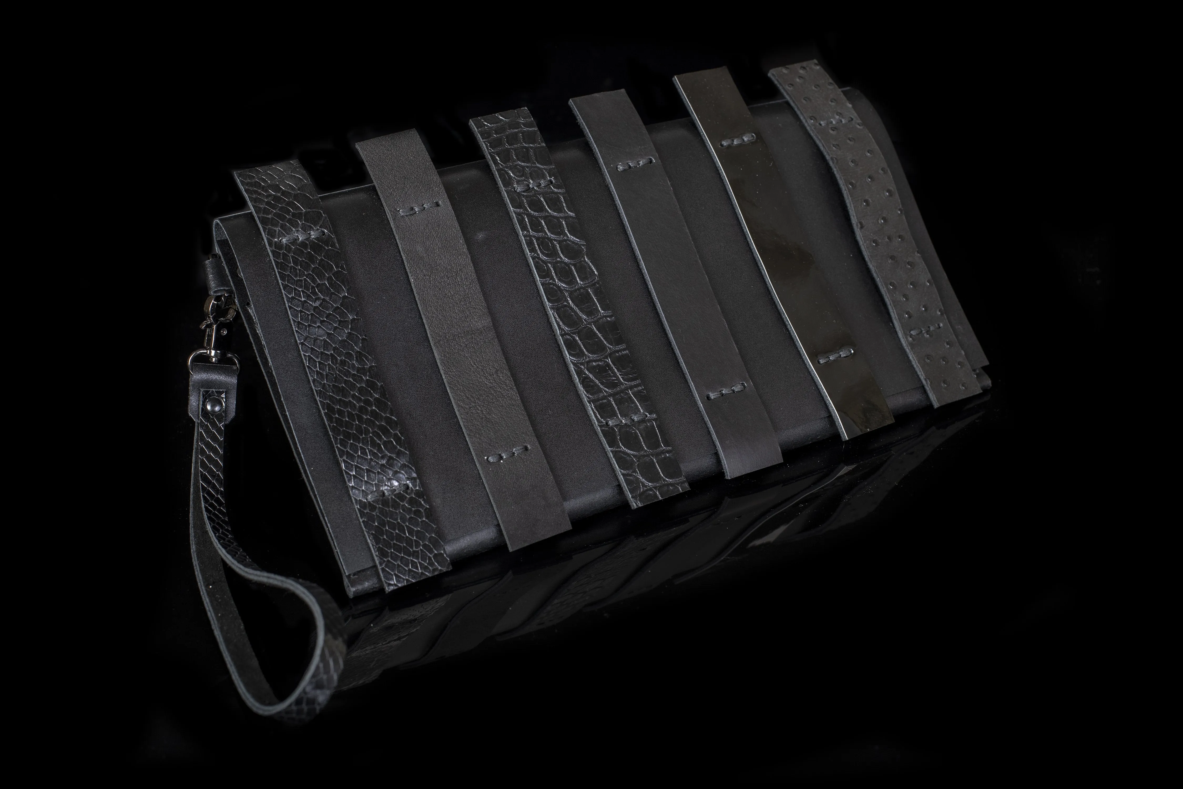 The Parallel Black Clutch Bag
