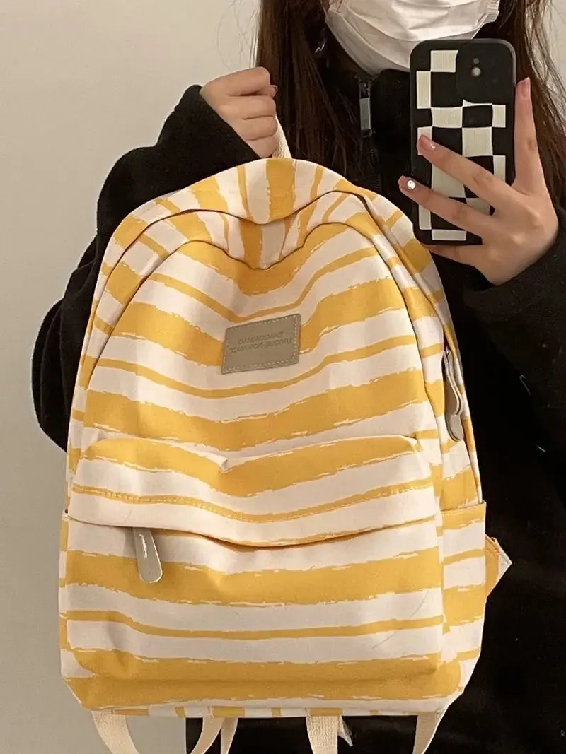UAKISS  -  Schoolbag Female Junior High School Girl College Student Backpack  New Striped High School Student Backpacks